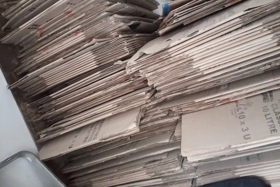 A stack of flat cardboard boxes